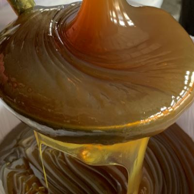 Semi fluid lubricating grease